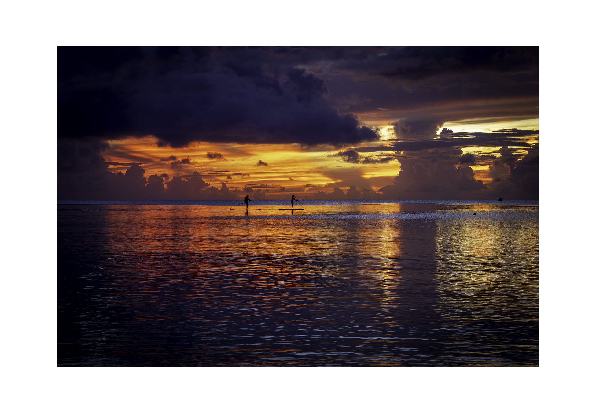 The 12x8 Tumon Bay Sunset fine art print, shown with an elegant white border and ready for framing.