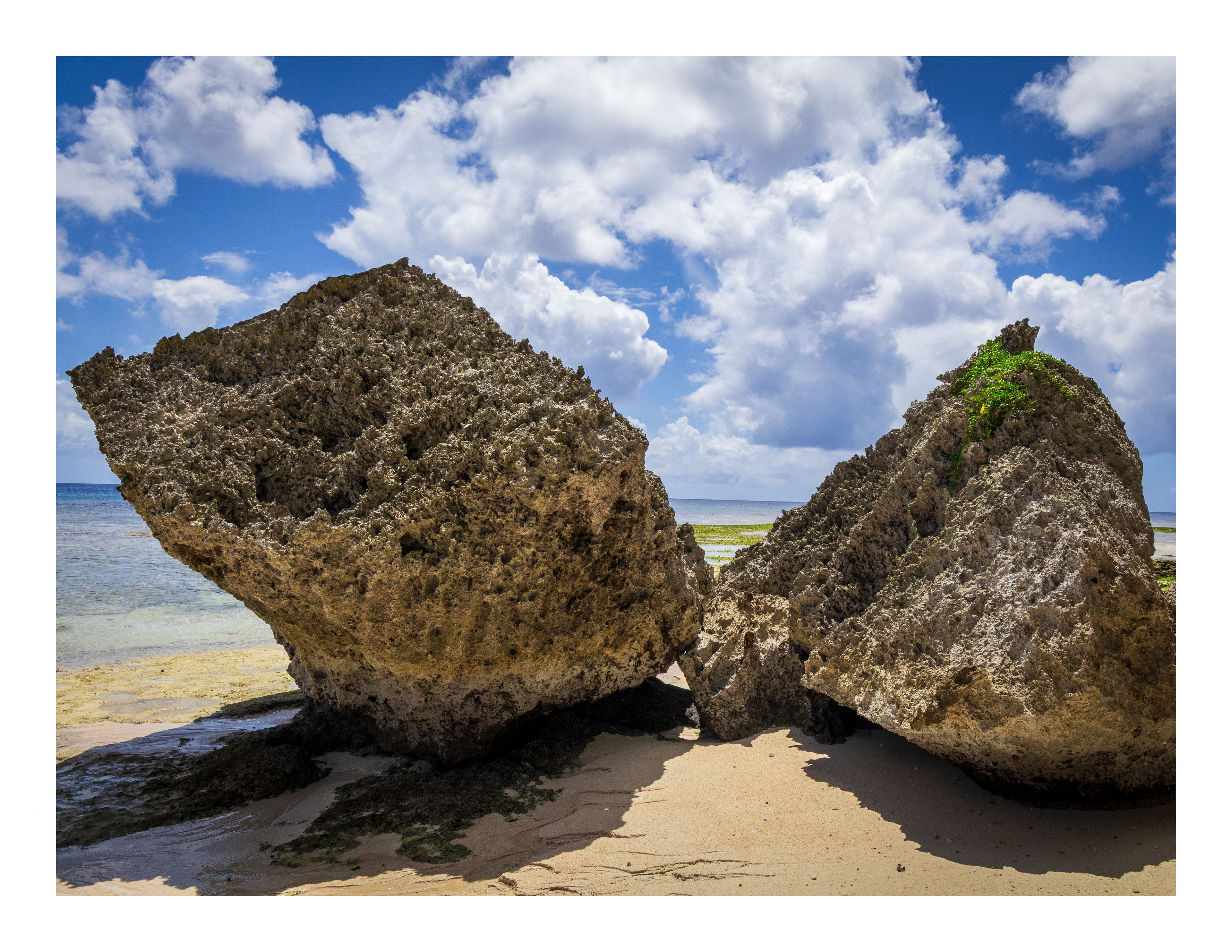 The 22x17 Gun Beach Rocks fine art print, shown with an elegant white border and ready for framing.