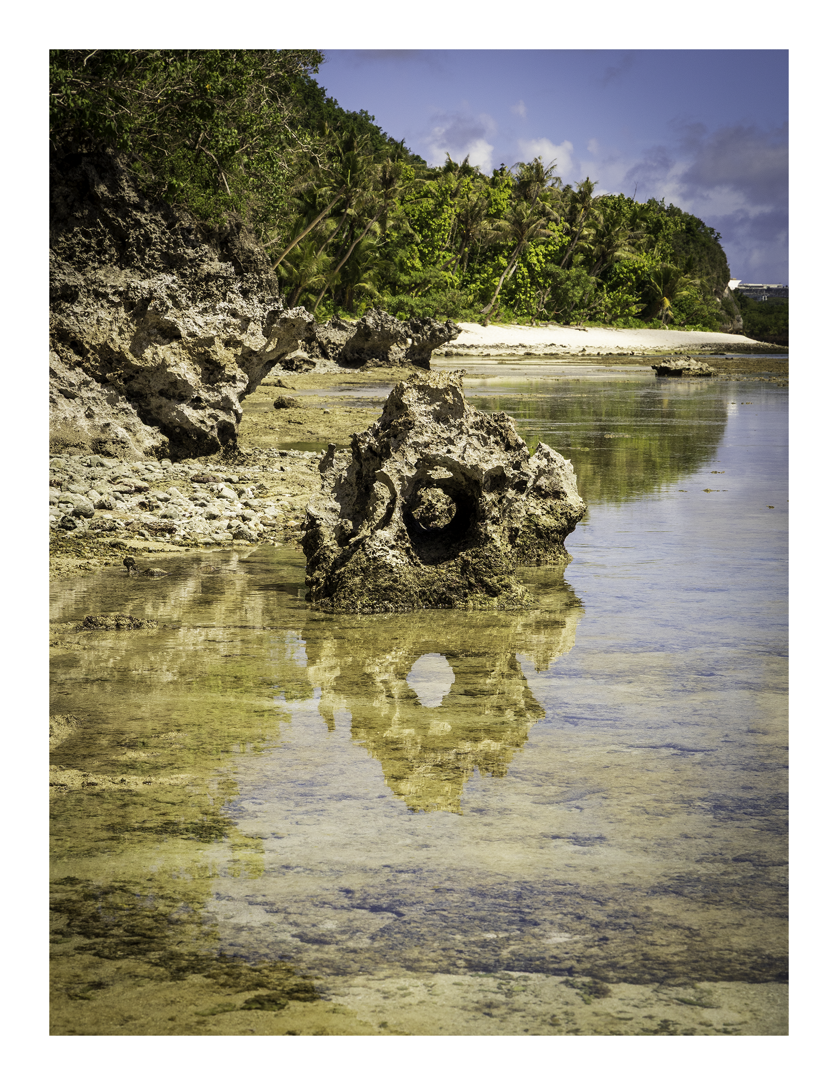 A 17x22 inch fine art coastal reflection photograph showing the product dimensions and symmetrical white handling border margins.