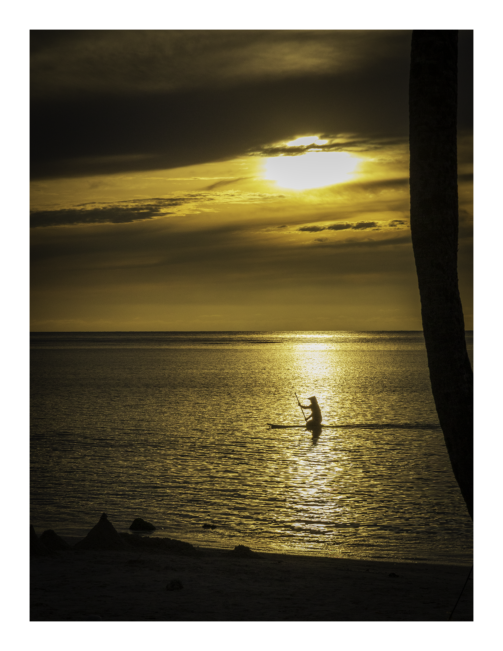 A 17x22 inch fine art print of a golden sunset and paddleboarder silhouette, showing product dimensions and clean white margins.