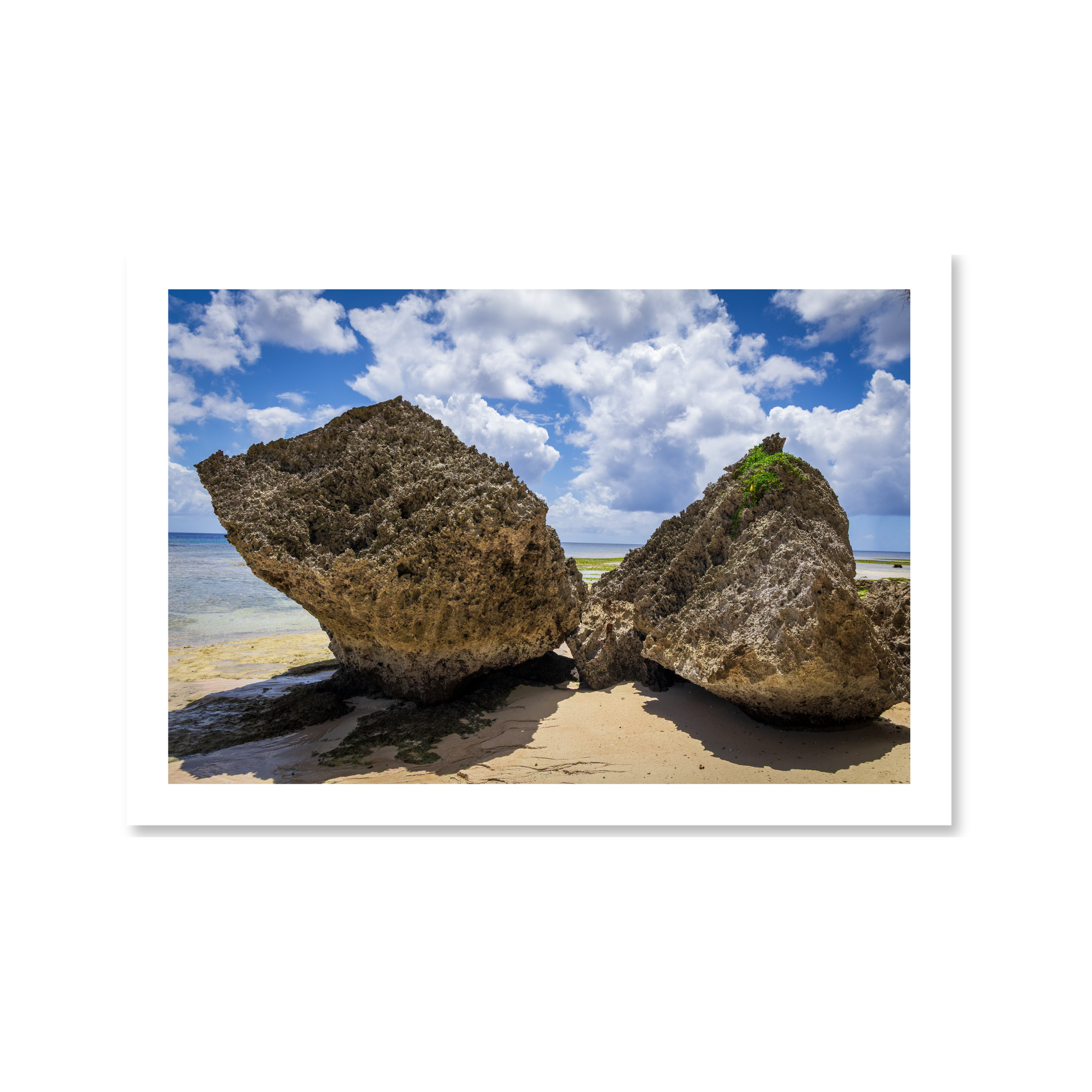 Fine art landscape photo of ancient karst limestone rocks at Gun Beach, Guam, featuring the tropical Pacific horizon.