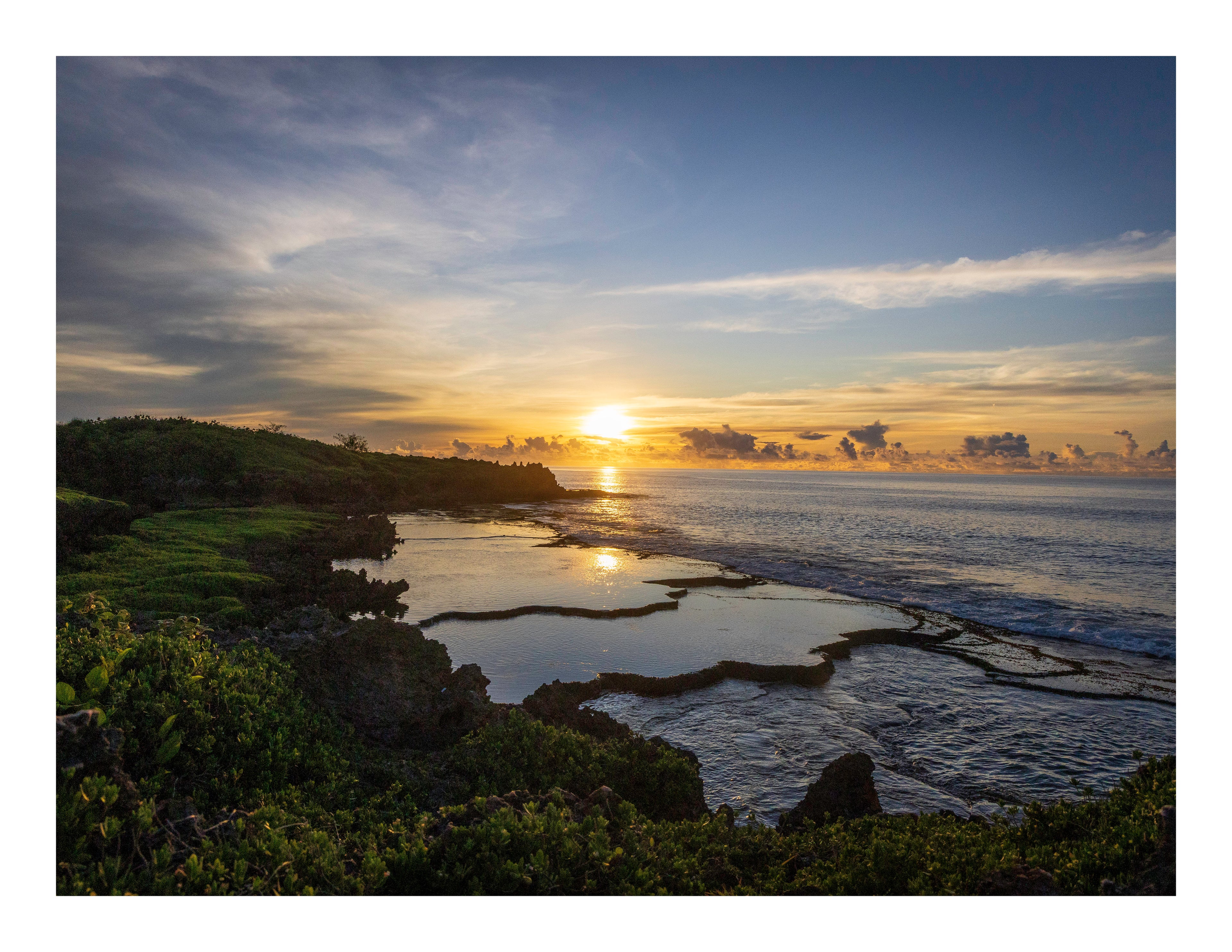 A 22x17 inch fine art print of the Inalåjan sunrise in Guam, showing the product dimensions and symmetrical white border margins.