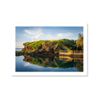 Fine art landscape photograph of the Inalåjan Natural Pools on the rugged coast of Guam, featuring volcanic rock formations.