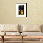 A framed three-quarter profile fine art portrait of Kira, a Eurasian Eagle-Owl,  displayed on a living room wall above a couch to show scale.